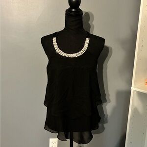 Elegant Black Sleeveless Top with Embellished Neckline